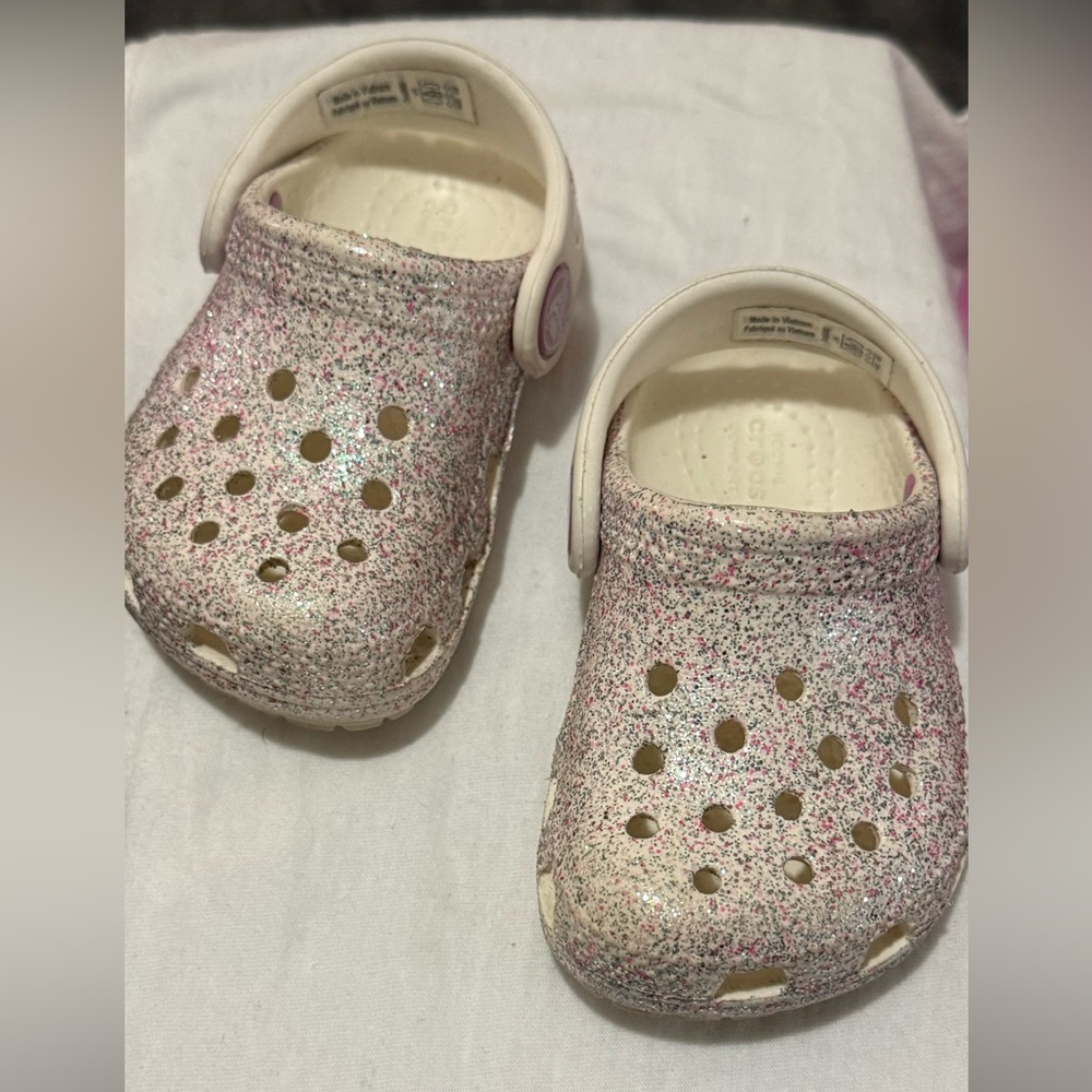 4C glitter crocs.